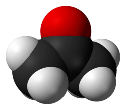 A ball structure of a molecule. Its backbone is a zig-zag chain of three carbon atoms connected in the center to an oxygen atom and on the end to 6 hydrogens.