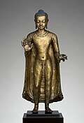Buddha offering protection; late 6th–early 7th century; copper alloy; height: 47&nbsp;cm, width: 15.6&nbsp;cm, diameter: 14.3&nbsp;cm; from India (probably Bihar / Later Gupta dynasty); Metropolitan Museum of Art