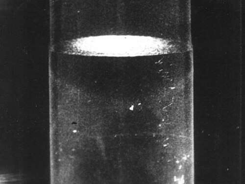 Superfluid phase at temperature below 2.17&nbsp;K (−270.98&nbsp;°C). In this state, the thermal conductivity is extremely high. This causes heat in the body of the liquid to be transferred to its surface so quickly that vaporization takes place only at the free surface of the liquid. Thus, there are no gas bubbles in the body of the liquid.