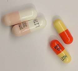 Four lithium carbonate capsules.