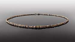 Necklace made of cut-off chips and low-quality rough diamonds