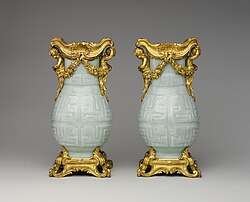Pair of Chinese vases with French Rococo mounts; the vases: early 18th century, the mounts: 1760–70; hard-paste porcelain with gilt-bronze mounts; 32.4 x 16.5 x 12.4&nbsp;cm; Metropolitan Museum of Art