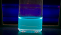 Perylene dissolved in dichloromethane exposed to Short Wave UV radiation