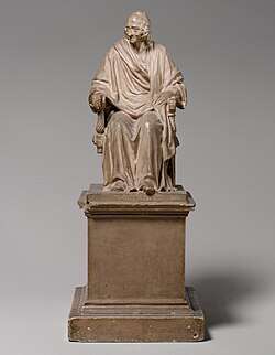 Seated Voltaire; by Jean-Antoine Houdon; 1778; plaster, tinted to imitate terracotta; overall: 35.6&nbsp;cm ×&nbsp;14.6&nbsp;cm ×&nbsp;20&nbsp;cm (14.0&nbsp;in ×&nbsp;5.7&nbsp;in ×&nbsp;7.9&nbsp;in); Metropolitan Museum of Art