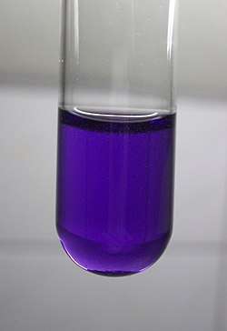Violet liquid in a test tube