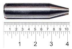 Shiny metallic cylinder with a sharpened tip. The overall length is 9&nbsp;cm and diameter about 2&nbsp;cm.