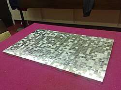 1,000 cubic centimeters of 99.9% pure platinum, worth about US$696,000 as of 29 Jun 2016 ($933,694 adjusted for inflation)[105]