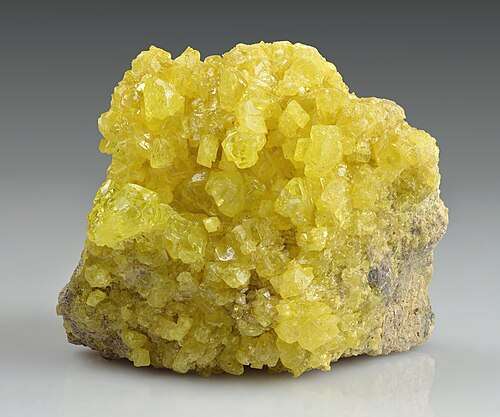 A powdery yellow crystalline material