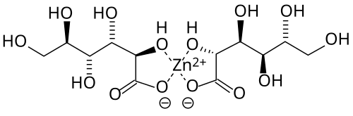 Skeletal chemical formula of a planar compound featuring a Zn atom in the center, symmetrically bonded to four oxygens. Those oxygens are further connected to linear COH chains.